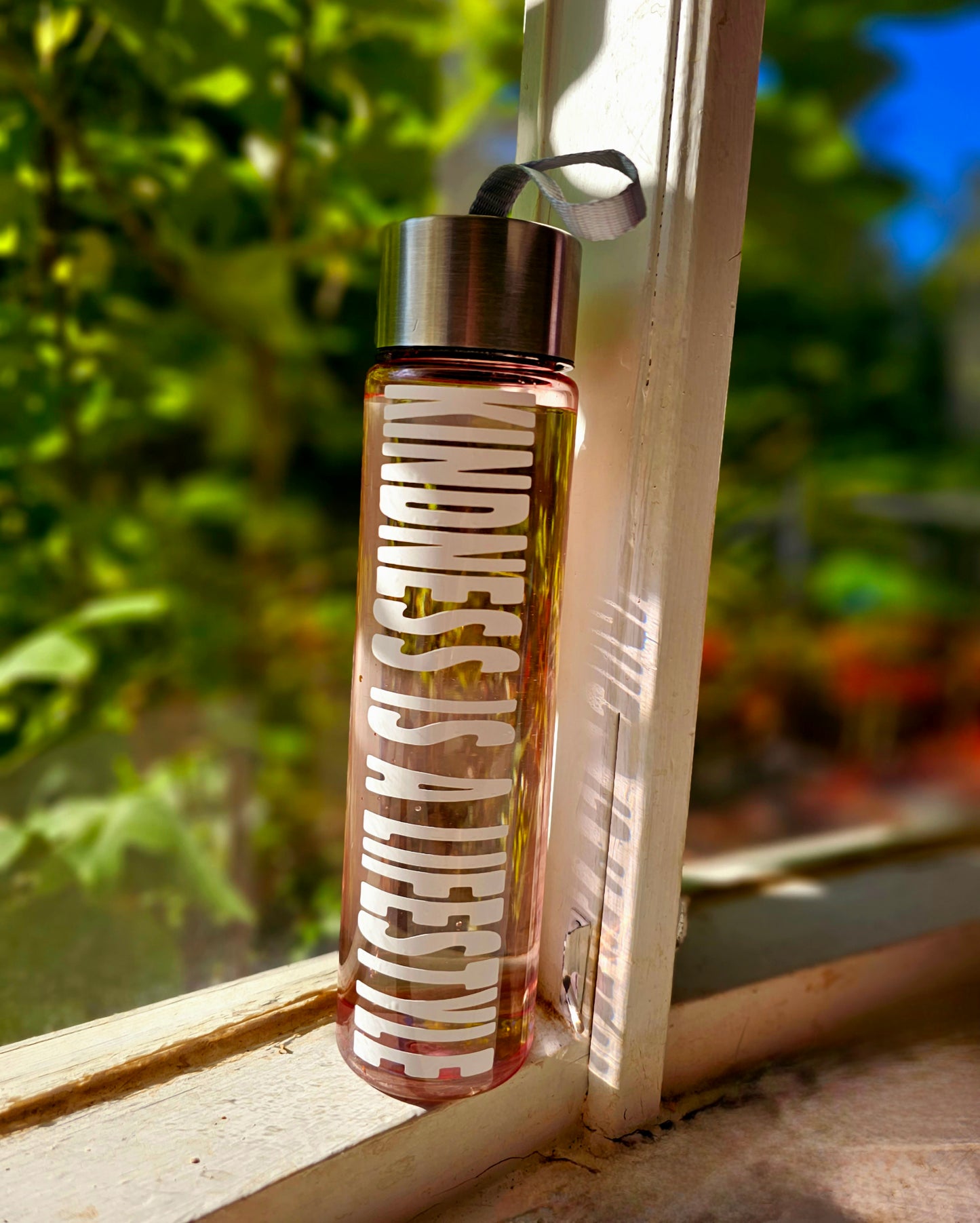 Kindness is a Lifestyle Pink Translucent Skinny Water Bottle